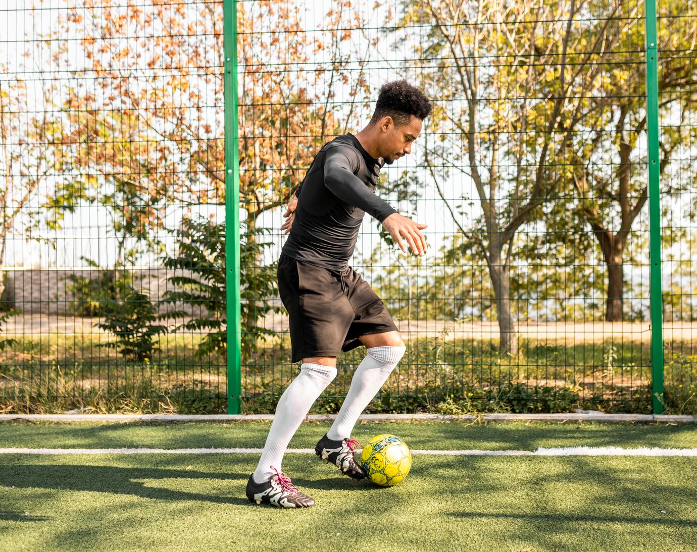 Footballers Community | man playing with football