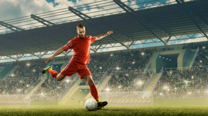 Footballers Community | football player ready to kick the football